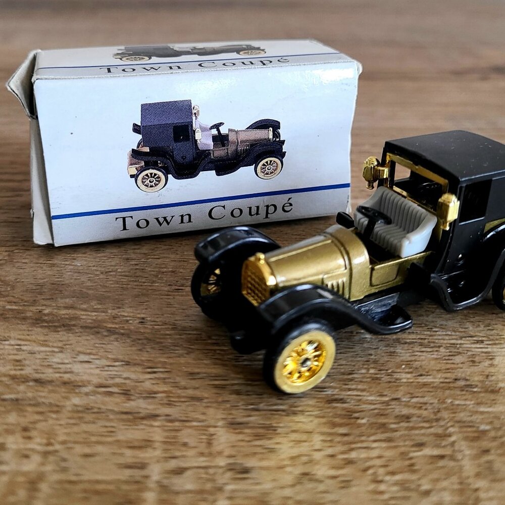 Town Coup mini car toy in original box.